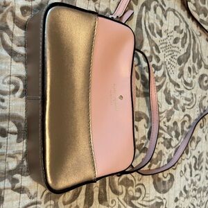 Kate Spade small body bag. Like new. Pink and gold.